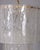 Chandelier with gilded metal structure and worked Murano glass plates, Italian design, 1960s. Up to 250V (Europe/UK...