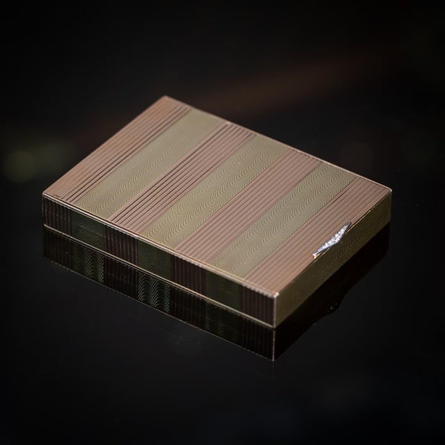 Antique early 20th century french art deco solid 14k (585) rose gold & yellow gold striped cigarette case. This exquisite...