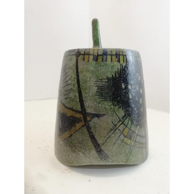Beautiful vase with lid in a truncated conical shape in glazed ceramic by carlo zauli produced in the city of faenza....
