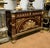 An extraordinary Louis XV style sideboard cabinet showcasing exceptional craftsmanship and lavish ornamentation...
