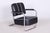 This designe pair of armchairs originating from the 1930s represents an exceptional and highly valued example of...