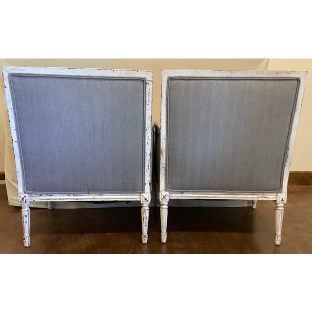 These country style Bergeres features the straight lines, fluted, classical columns for legs topped with a small square...