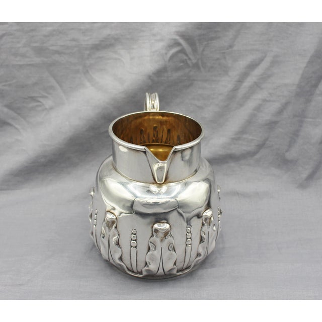 Sterling silver milk jug retailed by Mappin Bros, London, 1888. Mark of Goldsmiths & Silversmiths Co. (William Gibson &...