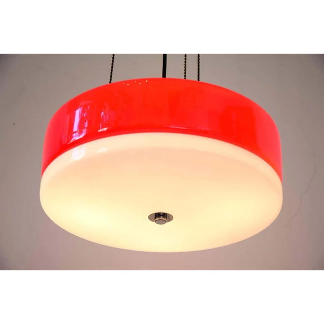 1950s ceiling lamp in red and white. Four bulbs excellent original condition. European Plug (up to 250V).The wiring of...