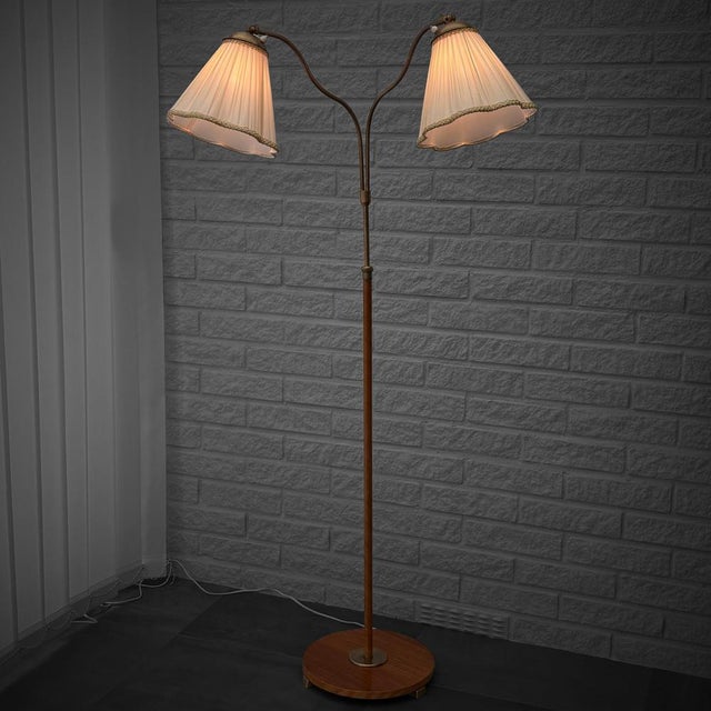 A beautiful floor lamp, manufactured in Sweden by an as yet unidentified maker during the 1930s. The lamp features a...
