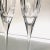 Contemporary set of 2 clear crystal fluted champagne glasses 2.10"D X 9.10"H , makers mark reads "Disaronno" Excellent...