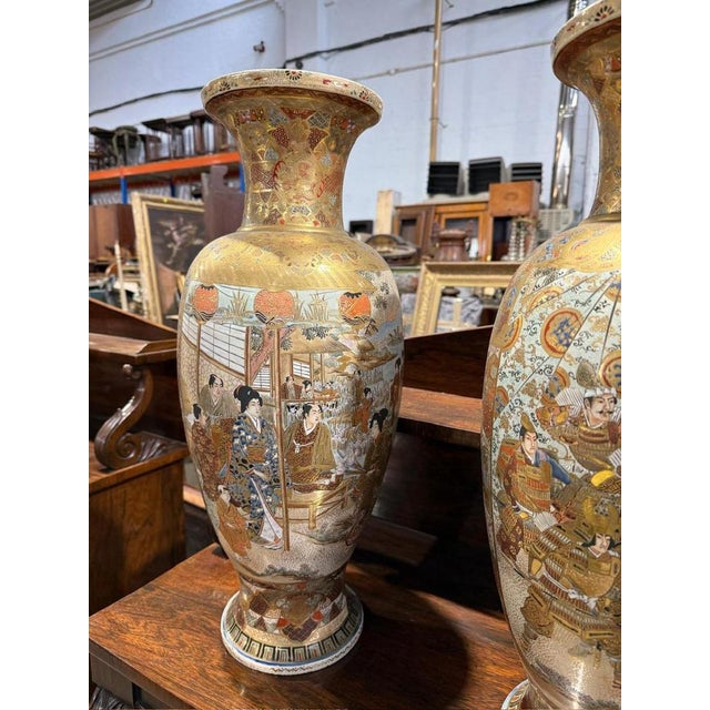 An exquisite pair of 19th-century Japanese Satsuma vases, embodying the rich artistic tradition of Satsuma pottery. These...