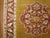 Exquisite Turkish Melas rug with a mustard colored ground, deep red border and central medallion. 3'3'' x 5'6''