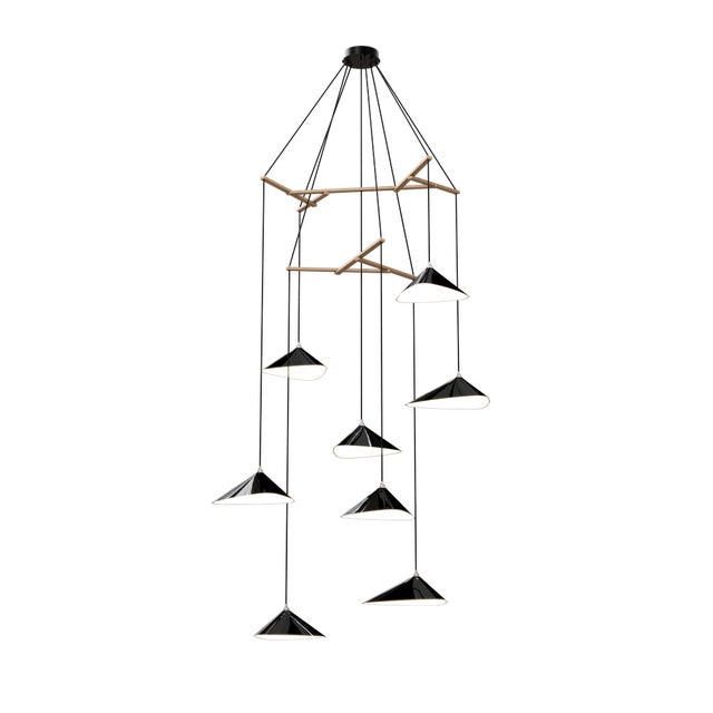 Emily is a series of handmade sheet steel lampshades in various finishes and spatial arrangements. The Vertical models of...