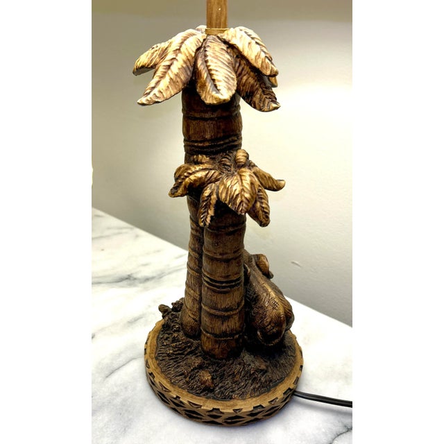 Vintage set of two elephant accent table lamps. Made of resin with a bridgetown bronze finish. Gingham, silk lined lamp...