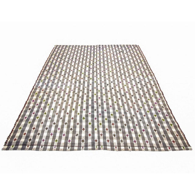 Modern vintage hand woven Kilim rug from Adana region of Turkey. Approximately 50-60 years old. In very good condition