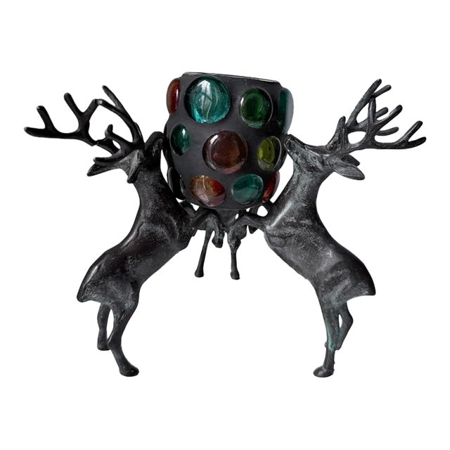 Vintage Cast Iron Reindeer Candle Holder With a Multi-Colored Glass Pillar For Sale