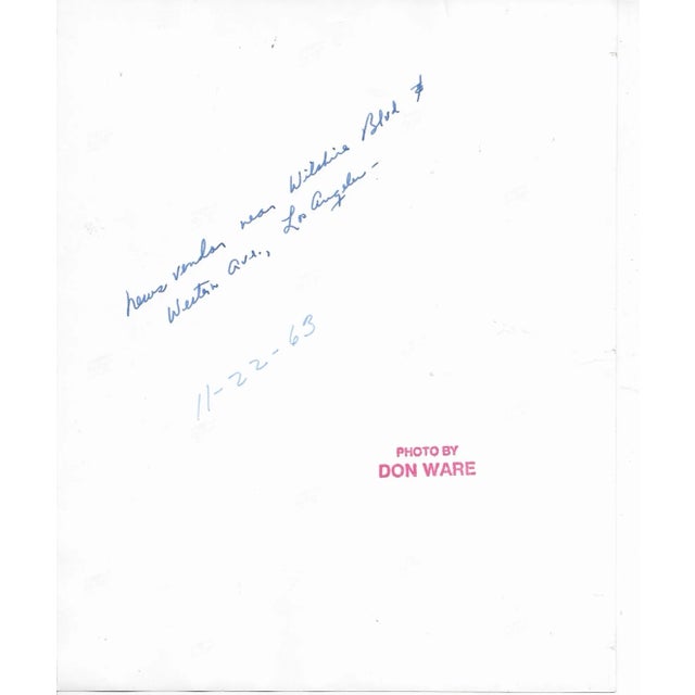 1963 black and white photo by Los Angeles, California photographer Don Ware (1921-2006) of a newsstand on the corner of...