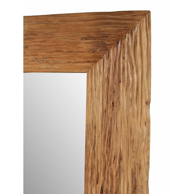 Full-length teak mirror with a richly textured deep grain and warm, vintage sun-aged patina that highlights its organic...