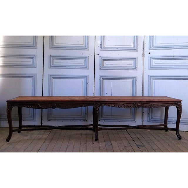 Louis XV style cane bench with a crisscross design in very good condition. Ideal for furnishing an entryway. Dimensions:...