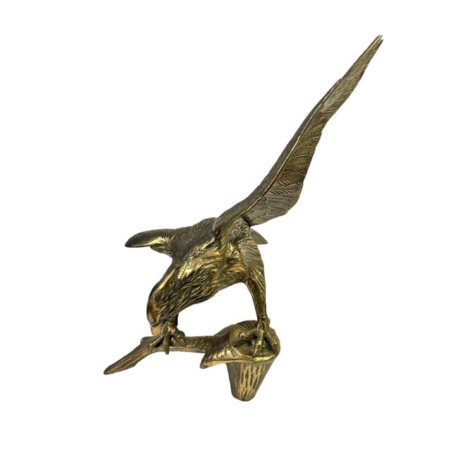 Accentuate your decor with this beautiful and majestic eagle perched on a branch. This large solid cast brass sculpture...