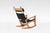 A vintage Hans J. Wegner rocking chair for Getama, crafted in Denmark during the 1960s. Featuring a light beech frame and...