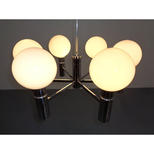 Sölken ceiling lamp with 6 frosted glass globes from the 1960s. I have official proof of authenticity such as vintage...