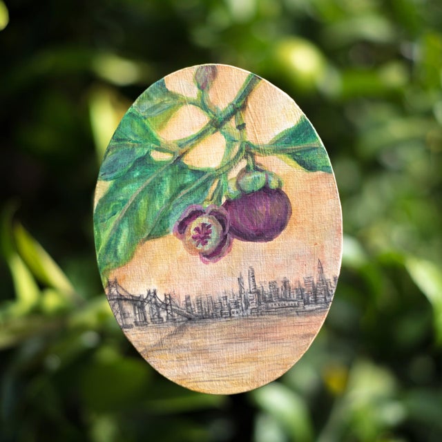 Perpetual Foreigner Mangosteen by Cindy Shih | Mixed Media on Panel Mangosteen fruit with a city skyline. For Sale