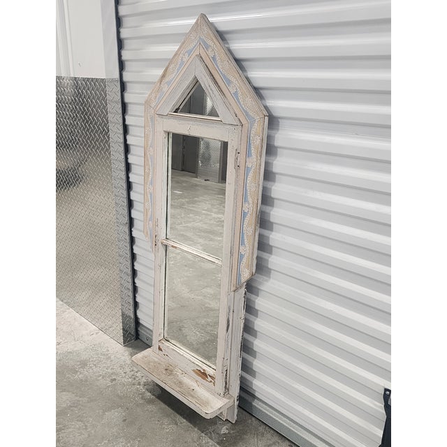 Vintage painted reclaim wood arched mirror with bottom shelf. The mirror was originally a window, panels and shelf were...