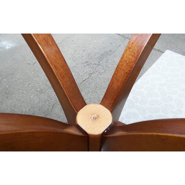 Add timeless elegance to your home with this Vintage Bombay Company Round Mahogany Pedestal Accent Table. Beautifully...