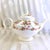This is an Arthur Wood multicolor floral teapot in Pattern 6333. I do not have a date for this pattern. The teapot is...