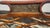 Vintage Regency Style Faux Bamboo Cane Settee With Reversible Down Cushion For Sale - Image 4 of 16