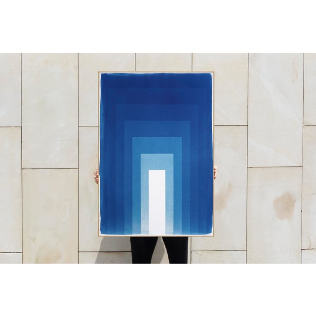 Rectangular Portal is a cyanotype monotype that plays with depth, geometry, and light. Composed of layered indigo...
