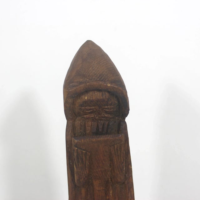 Primitive, rustic, carved wood monk sculpture. 8.5” tall 2” wide 1.5” deep