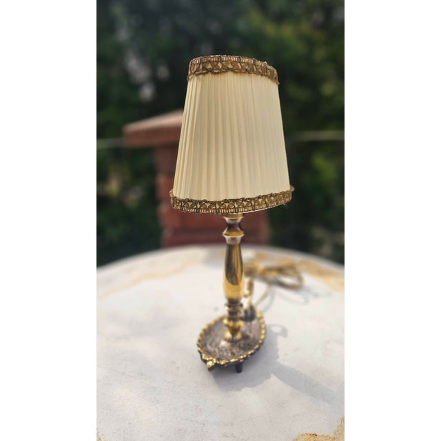 Brass lamp from the 1960s-1970s, dimensions: height 38.5 cm, depth 13 cm, width 19 cm. European Plug (up to 250V).The...