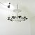 Here is a very unique French chandelier from the mid-20th century, taking elements from Art Deco combined with Hollywood...