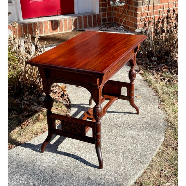 Offered is a late Victorian console table. It is in beautiful restored condition. Made from solid mahogany this table has...