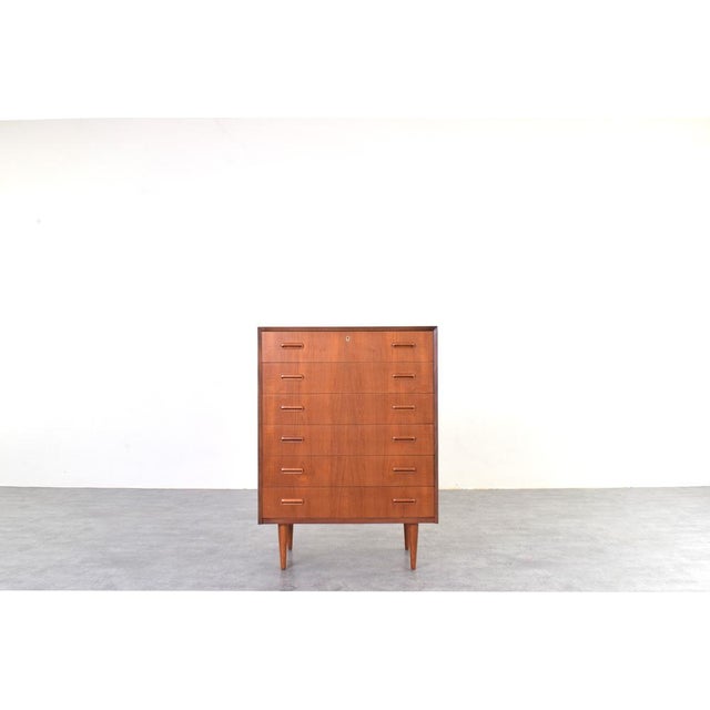 This Danish chest of drawers from the 1960s is an example of Mid-Century Modern design, which emphasized proportion,...