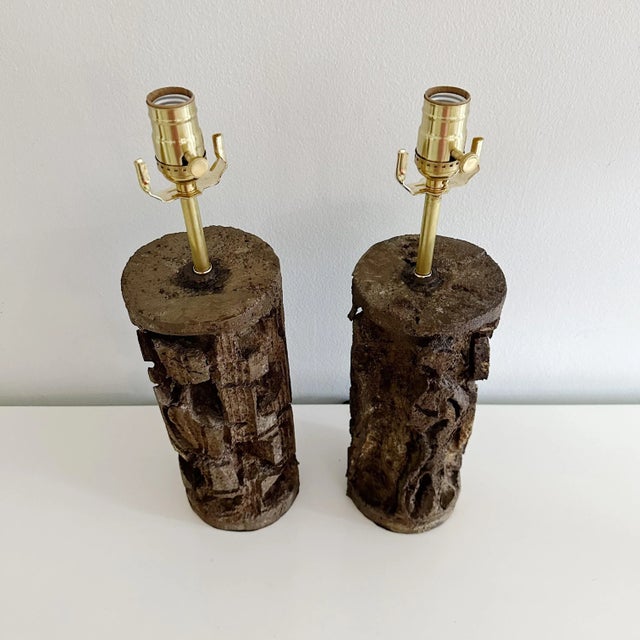 Captivating pair of handmade brutalist lamps. Crafted from sturdy aluminum with a rich bronze-colored finish, each lamp...