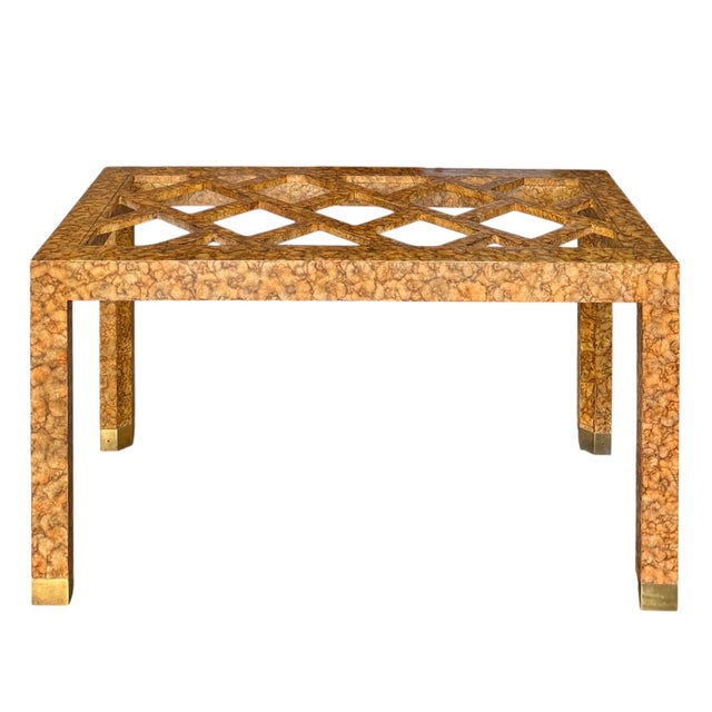 A dining table base by Henredon in oil-drop lacquer echoing the sophistication of tortoiseshell. With a simplistic...