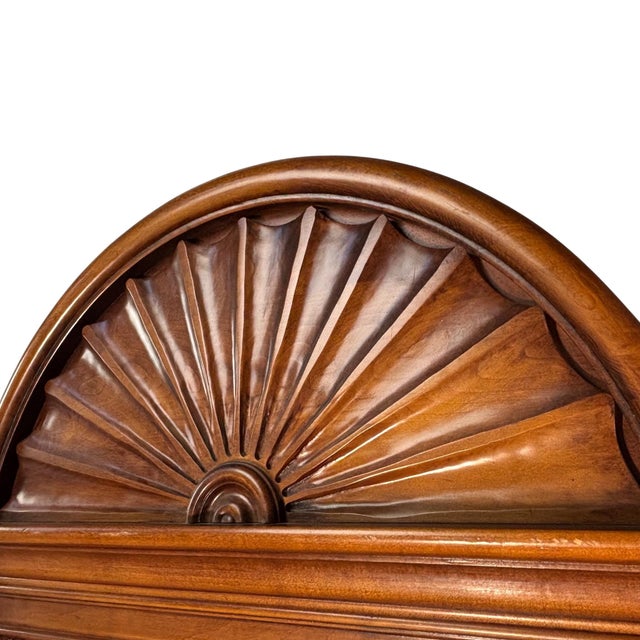 Deeply carved statement mirror made by Stroupe Mirror Company for Thomasville Furniture, handcrafted in the USA. The bold...