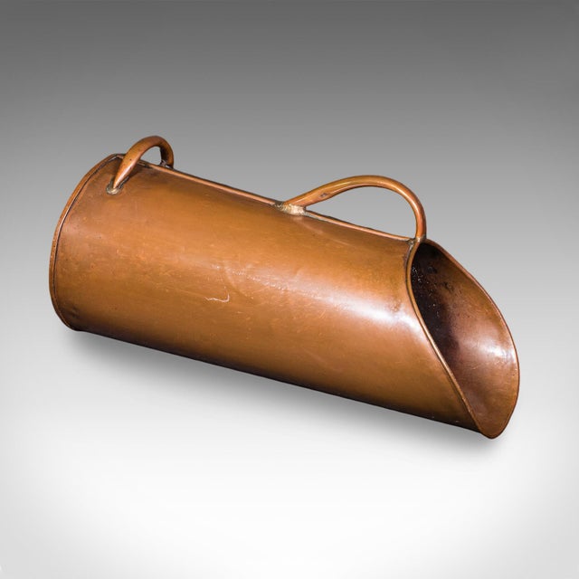 This is an appealing antique Cornish coal shaker. An English, copper fireside hod dating to the late Victorian period,...