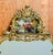 Vintage Rococo mirror, with its painted pastoral scene at the crest, exemplifies the Rococo aesthetic, possibly with later...