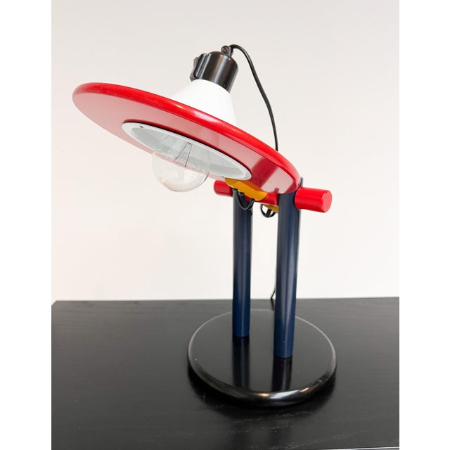 This is the Colorin lamp by Eduardo Albors from 1979. A wooden design in primary colors, constructed from simple geometric...