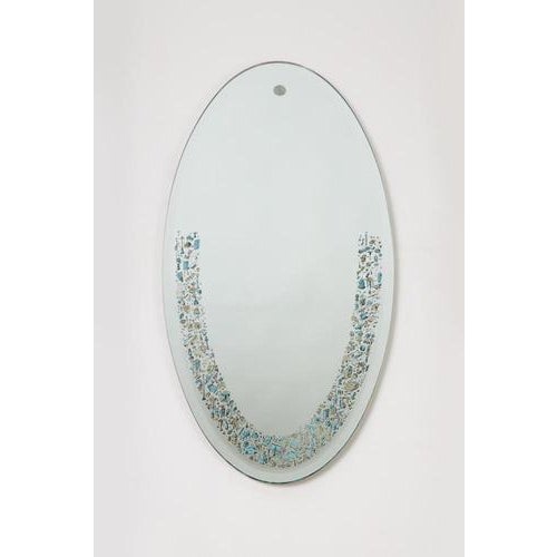 Mirror with a digitally printed decorative border, designed to create striking plays of light and reflection as the...