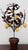 This is an unusual tole lemon topiary tree in a heavy brown tole metal pot. The lemons are made of some sort of stone. The...