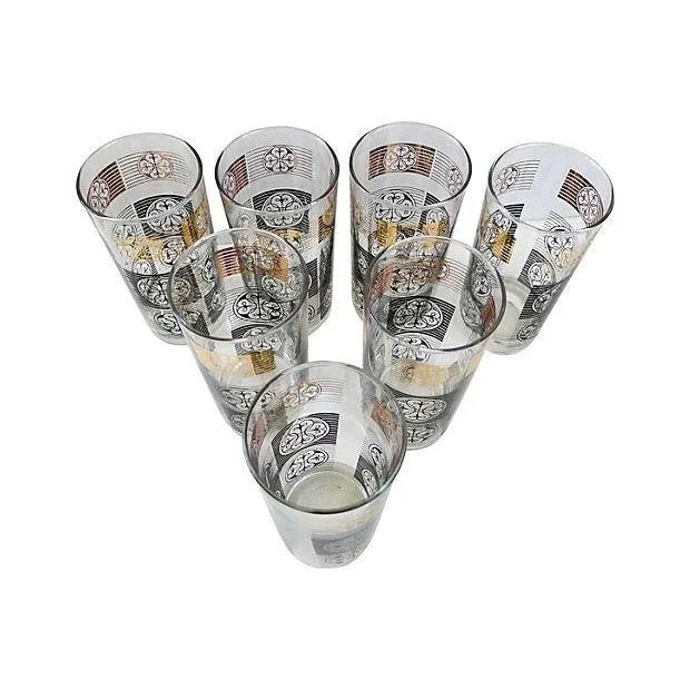Set of seven mid-century cocktail glasses with stenciled design. No maker's mark.