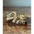 This vintage brooch is sculpted into the sleek, elongated form of a leopard in mid-stride, its body and curling tail...