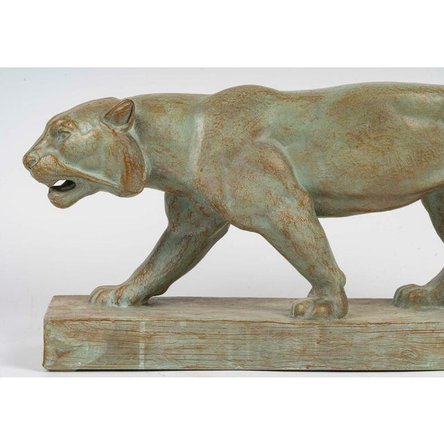 Terracotta sculpture of a lioness, signed henri bargas, 20th century. Early 20th century terracotta sculpture of a...