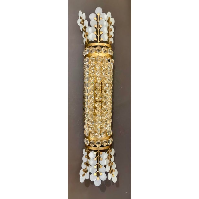 Original retail $3000, stylish Currey and Company Modern Crystal and Brass Bradshaw Wall Sconces Pair, frosted disc...