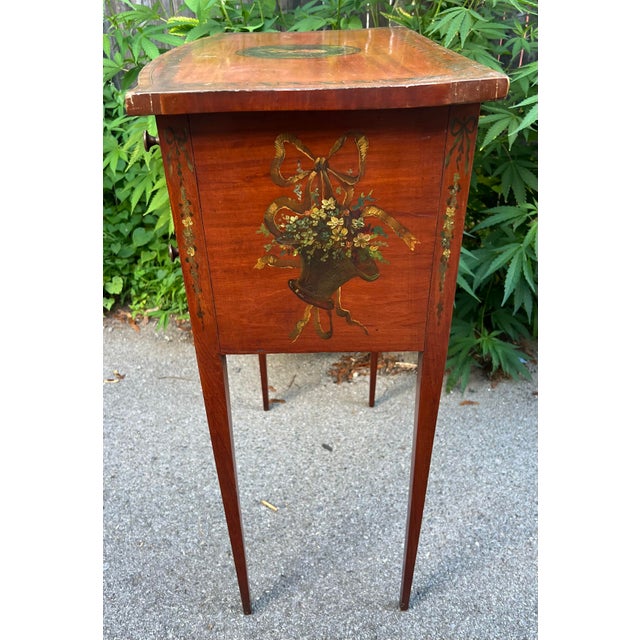 Beautiful small Sheraton side table. It has a great hand painted portrait of a young girl on the top. It has beautiful...