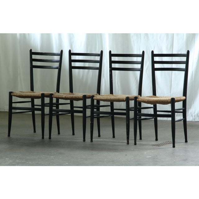 We present this superb set of eight mid-century dining chairs from the esteemed Italian maker, Gessef Consorzio Sedie...