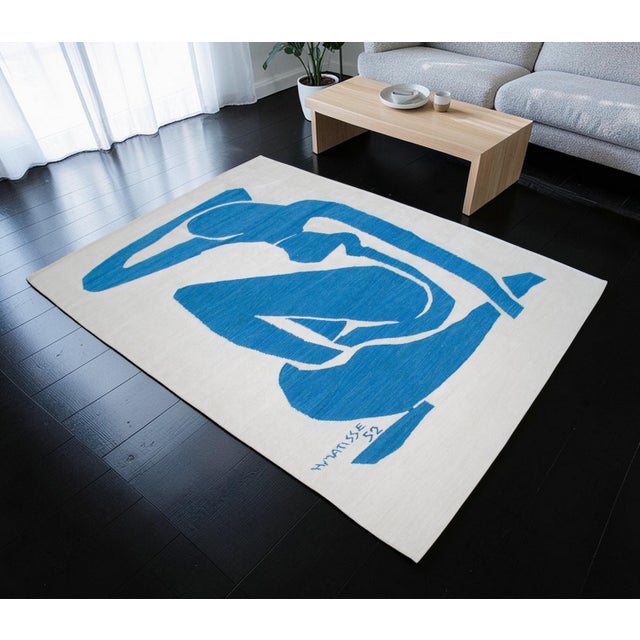 Woven by hand in the Aegean Anatolian region during the 2020s, this extraordinary organic silk flatweave rug is a...