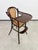 A delightful and exceptionally collectible early 20th-century bentwood convertible children's high chair...