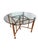 Table designed by Lyda Levi for McGuire in the 1980s. The base is made of bamboo with leather bindings, and the top is...